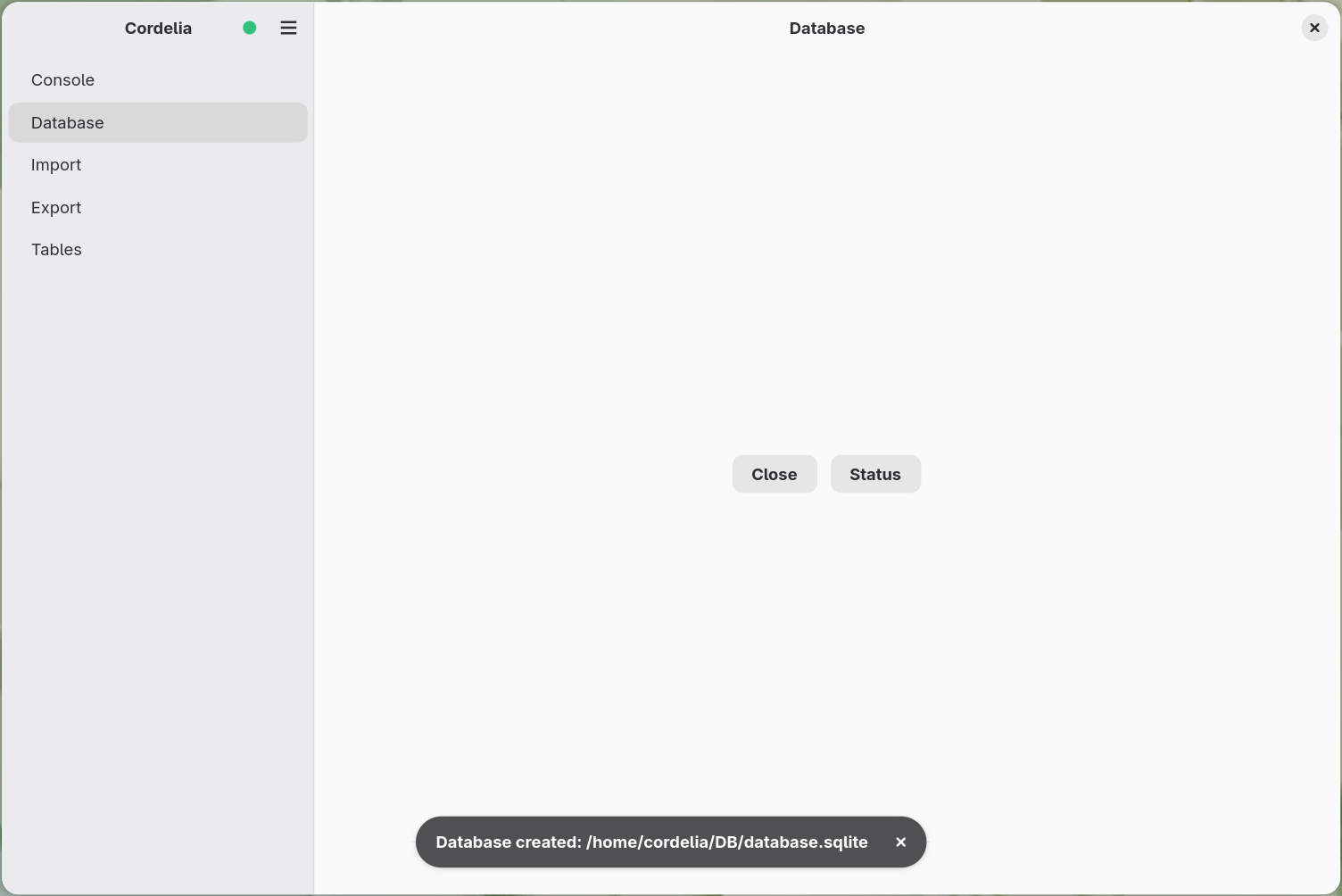 The Database panel after creation, now showing a green open-database indicator next to
        the app name and Close/Status buttons in place of Create/Open.