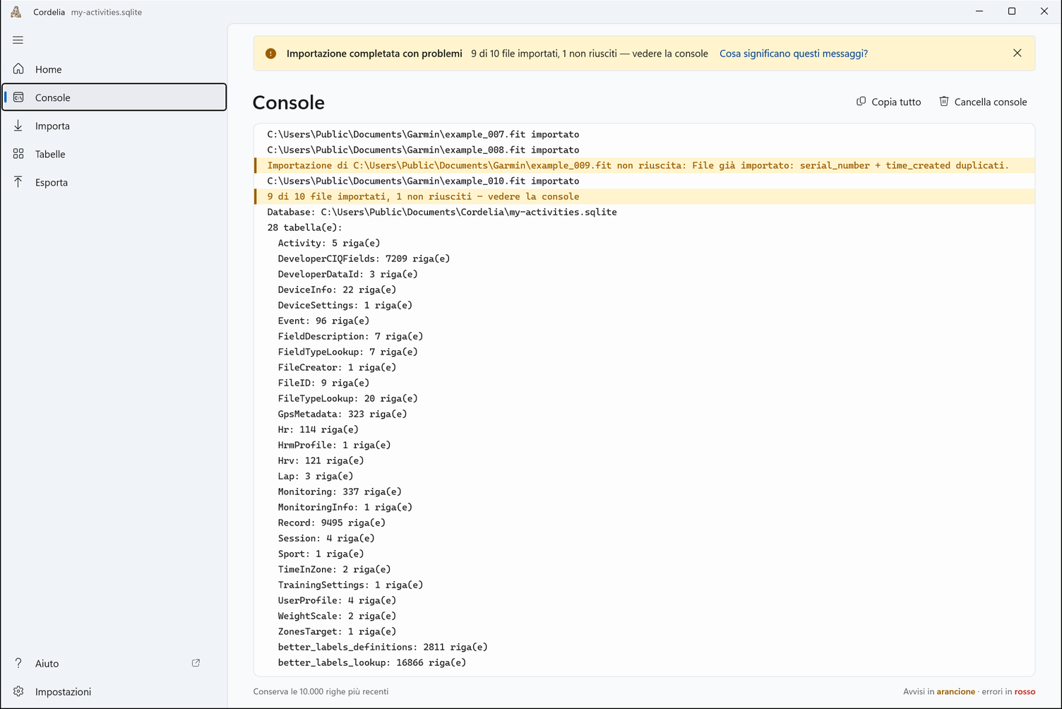 La console dopo un'importazione: ogni file importato, una riga arancione per un duplicato, un riepilogo di 9 file importati su 10 e il numero di righe di ogni tabella, con Copia tutto e Cancella console in alto.